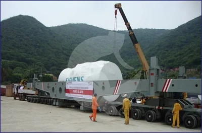 Transporte de transformador SIEMENS con grúa especializada